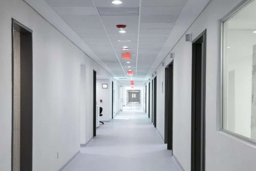 Bright hospital corridor — illustrative stock photograph
